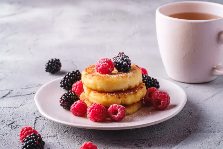 Cottage cheese pancakes and powdered sugar, curd fritters